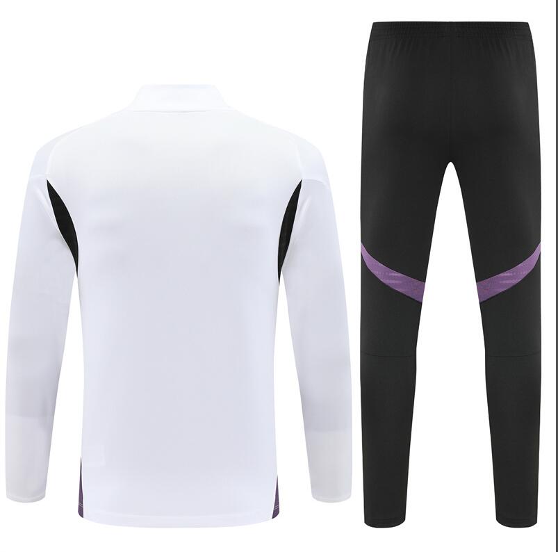 Manchester United 25/26 - Tracksuit (Half-Zip)